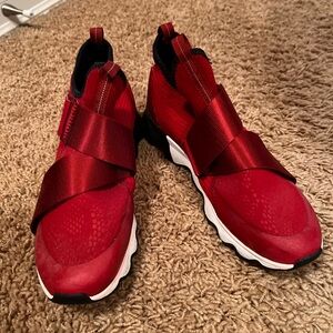 Women Red Sorel Velcro crisscross tennis shoes